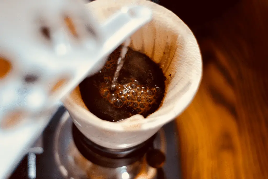 Image of a v60 being brewed with filter filled.